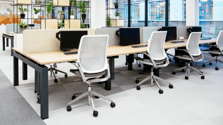 A modern office space with Eva task chairs